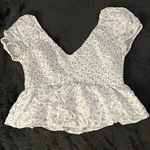 White Hollister top with cute blue flowers.